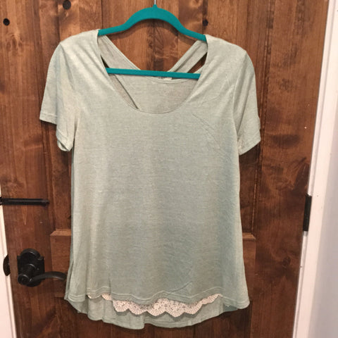 Soft green criss cross tee with ruffle